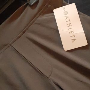 Semi-fitted with a mid-rise waist that hold you in